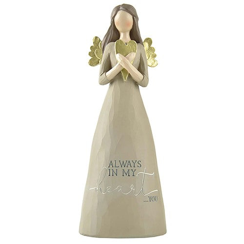 Angel figurine, with long brown hair, gold wings.