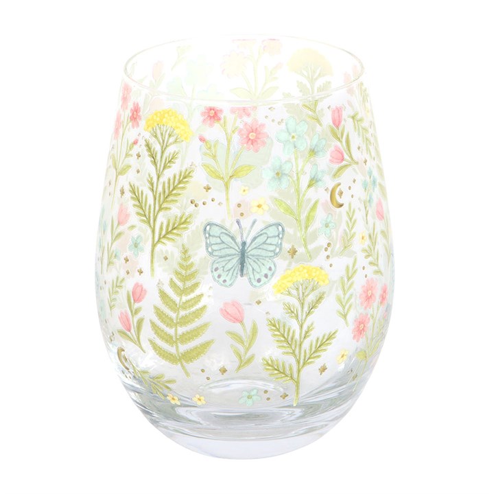 Stemless wine glass with floral and butterfly design on a white background