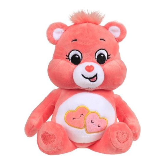 Pink plush care bear with hearts n her tummy