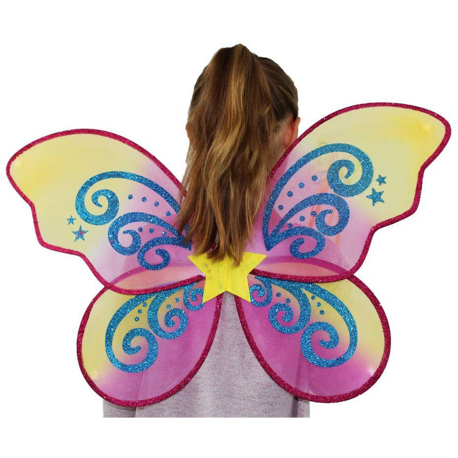 Girl wearing star fairy wings